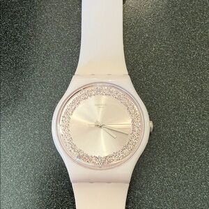 White Swatch with decorative sparkles.